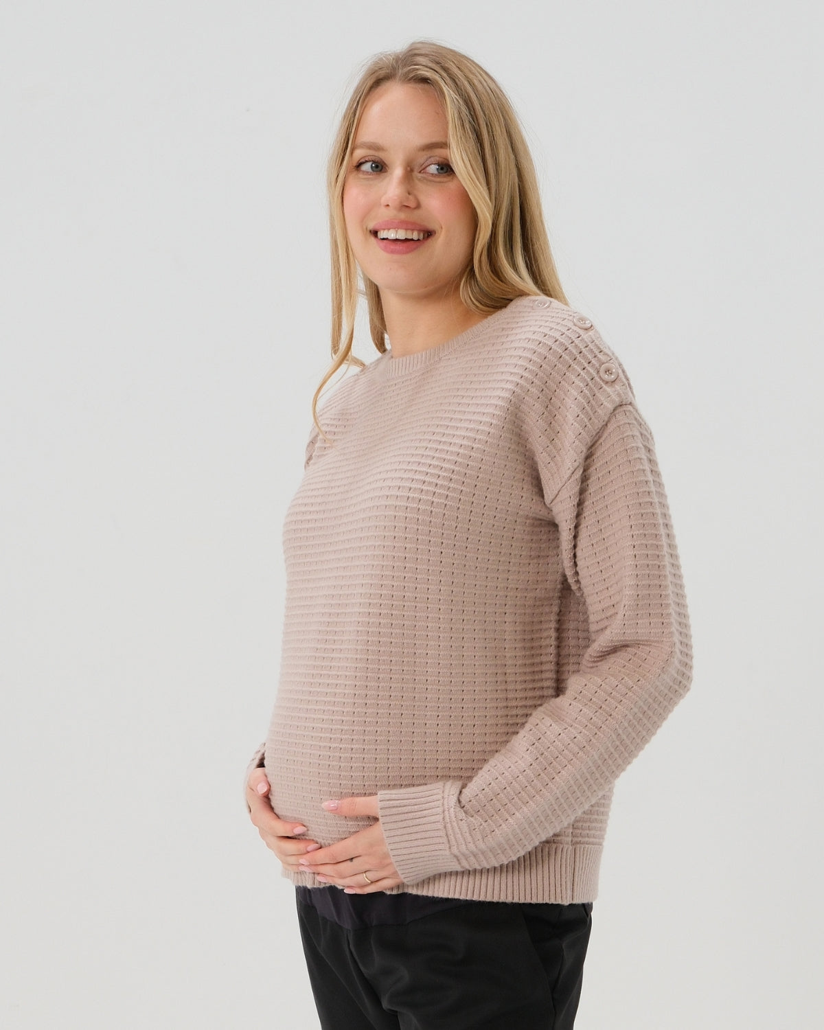 Taupe neutral premium maternity and nursing sweater in stretch cotton box knit. Featuring shoulder button detail for breastfeeding and discreet hem thumbholes for an extra cozy fit. Oversized fit is flattering, polished, and versatile - transitioning from pregnancy workwear to loungewear to streetwear with ease. Petite and tall friendly; available in regular and plus size.