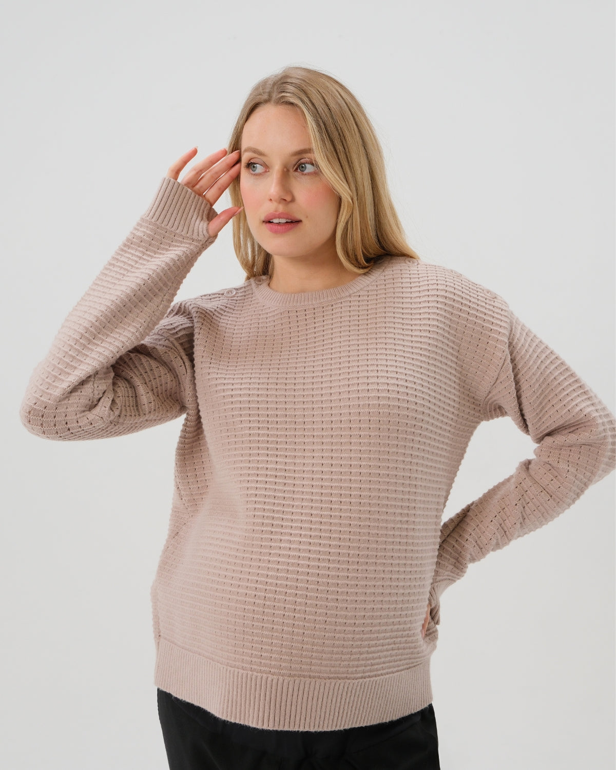 Taupe neutral premium maternity and nursing sweater in stretch cotton box knit. Featuring shoulder button detail for breastfeeding and discreet hem thumbholes for an extra cozy fit. Oversized fit is flattering, polished, and versatile - transitioning from pregnancy workwear to loungewear to streetwear with ease. Petite and tall friendly; available in regular and plus size.