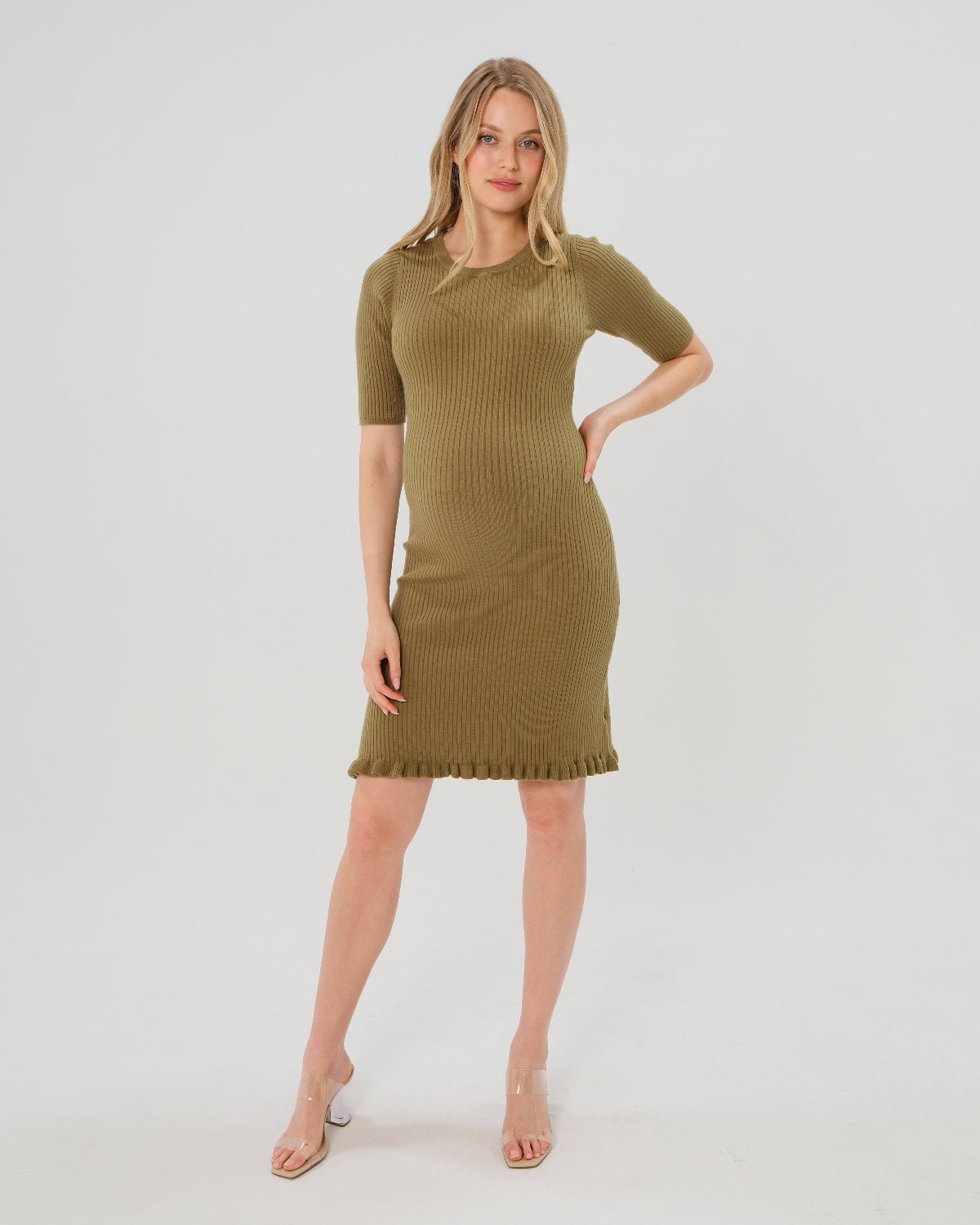Olive green maternity sweater dress with 3/4 sleeves, feminine ruffle hem detail, and luxurious cotton stretch knit. Perfect for work outfits, wedding guest, holiday parties, baby showers, and street style. Postpartum friendly.