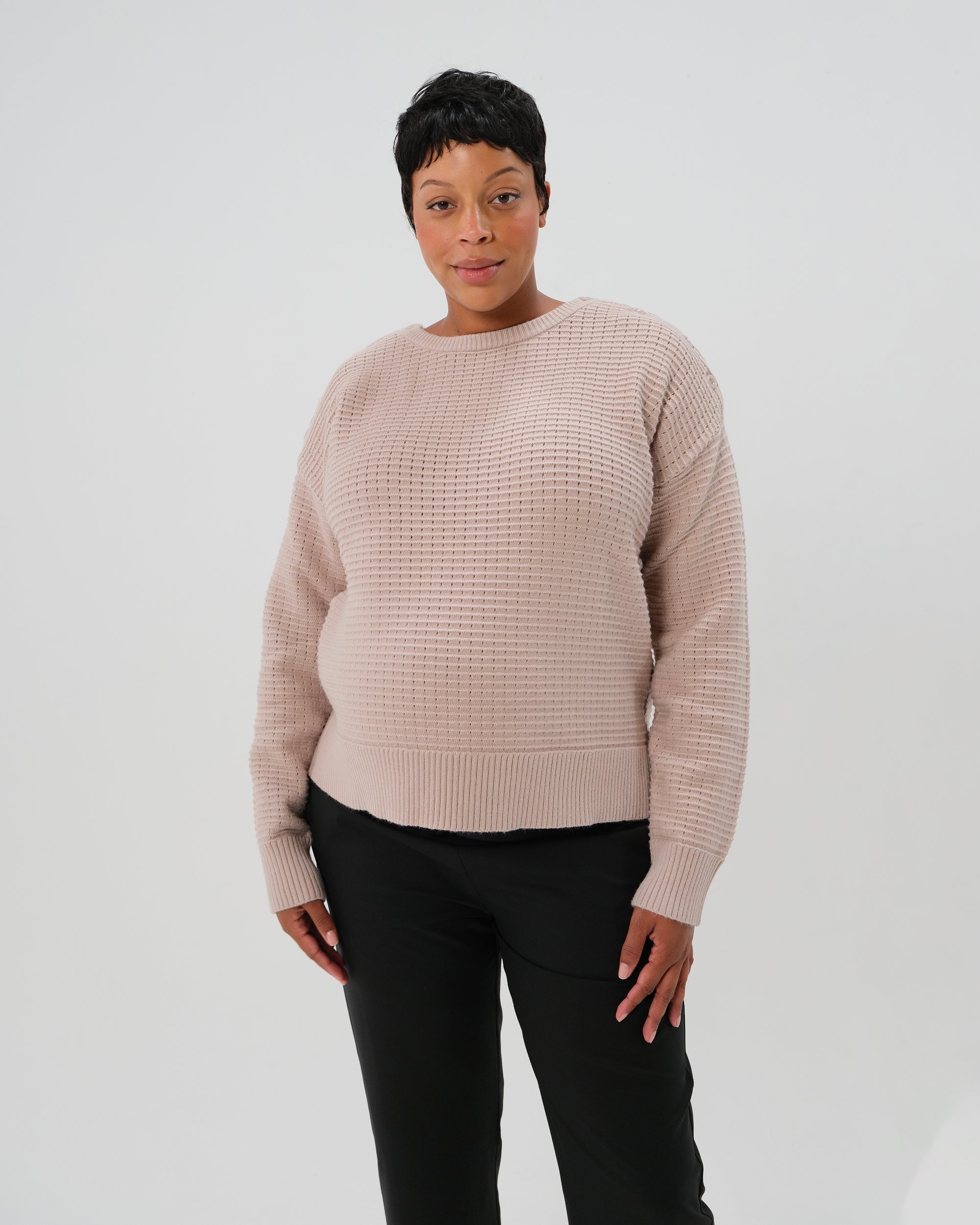 Taupe neutral premium maternity and nursing sweater in stretch cotton box knit. Featuring shoulder button detail for breastfeeding and discreet hem thumbholes for an extra cozy fit. Oversized fit is flattering, polished, and versatile - transitioning from pregnancy workwear to loungewear to streetwear with ease. Petite and tall friendly; available in regular and plus size.