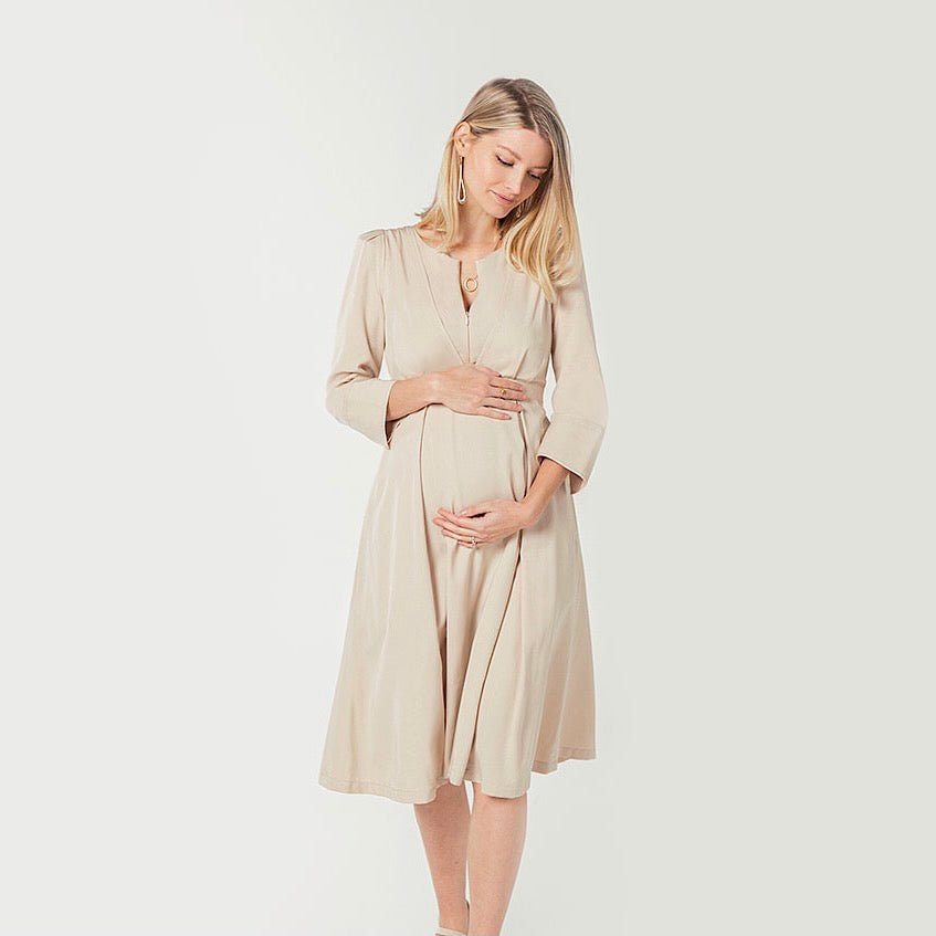 Maternity dresses and nursing dresses by MARION. Luxury baby shower dresses, wedding guest dresses, maternity sweater dresses, and breastfeeding dresses for work. 