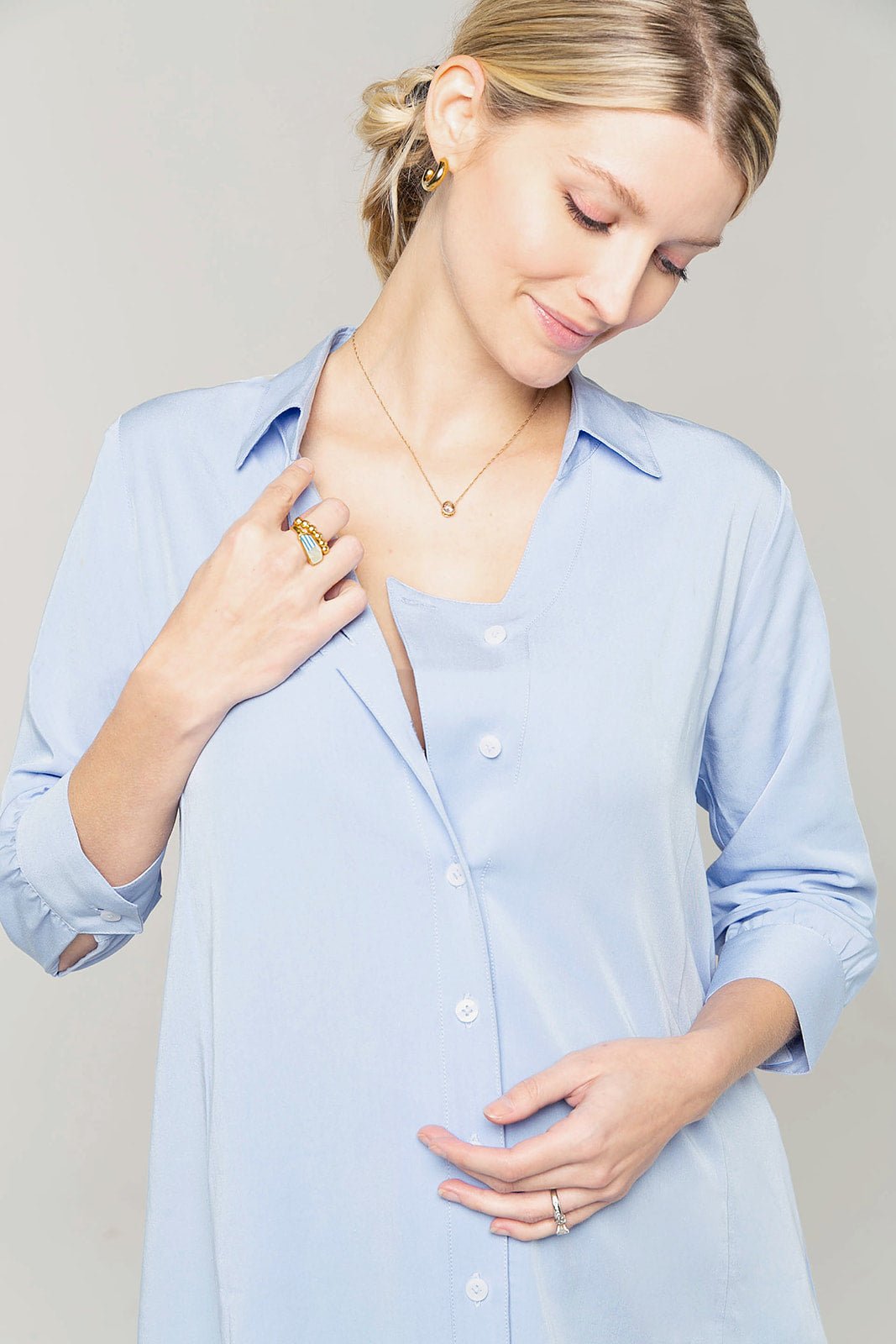 Maternity blouse & nursing top by MARION. Breastfeeding tanks, buttondown nursing blouses, and maternity suit tops. Petite & standard sizing. Sustainable brand. 