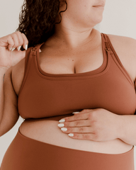 Brown maternity and nursing sports and athleisure bra in luxe stretch nylon with easy breastfeeding clips and a stylish racerback design. Full support. Make a matching set with coordinating maternity bike short or maternity leggings. 