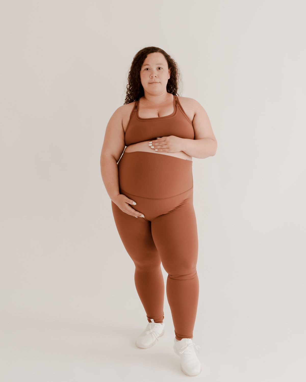 Scrunch butt maternity leggings in a flattering stretch belly style perfect for pregnancy and postpartum. Sand brown. 