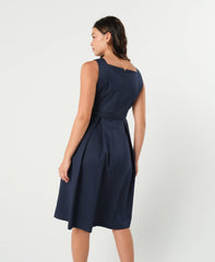 Luxury blue sleeveless maternity dress, from MARION's collection of elevated maternity and nursing dresses. Sustainable, available in standard and petite maternity sizes. Features designer breastfeeding access. Perfect maternity wedding guest dress, baby shower dress, or maternity tea party dress.