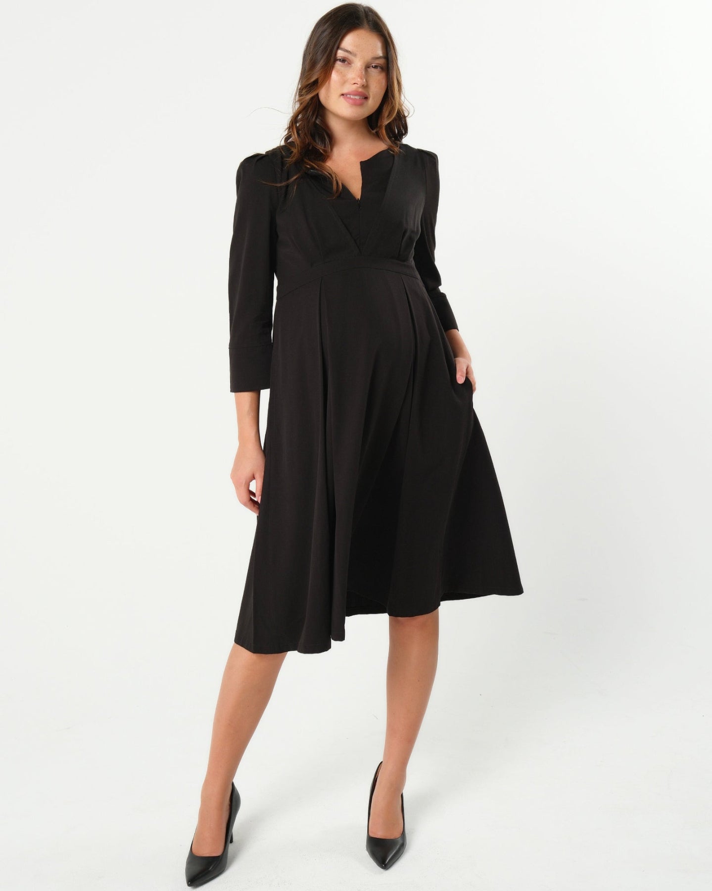 Best selling black maternity and nursing empire dress for business, baby shower, wedding guest, party, and formal occasions boasting glowing 5-star reviews. Sustainable TENCEL, zipper breastfeeding access, and full skirt with deep pockets, the Sarah is a sure favorite in our 2026 core collection. 