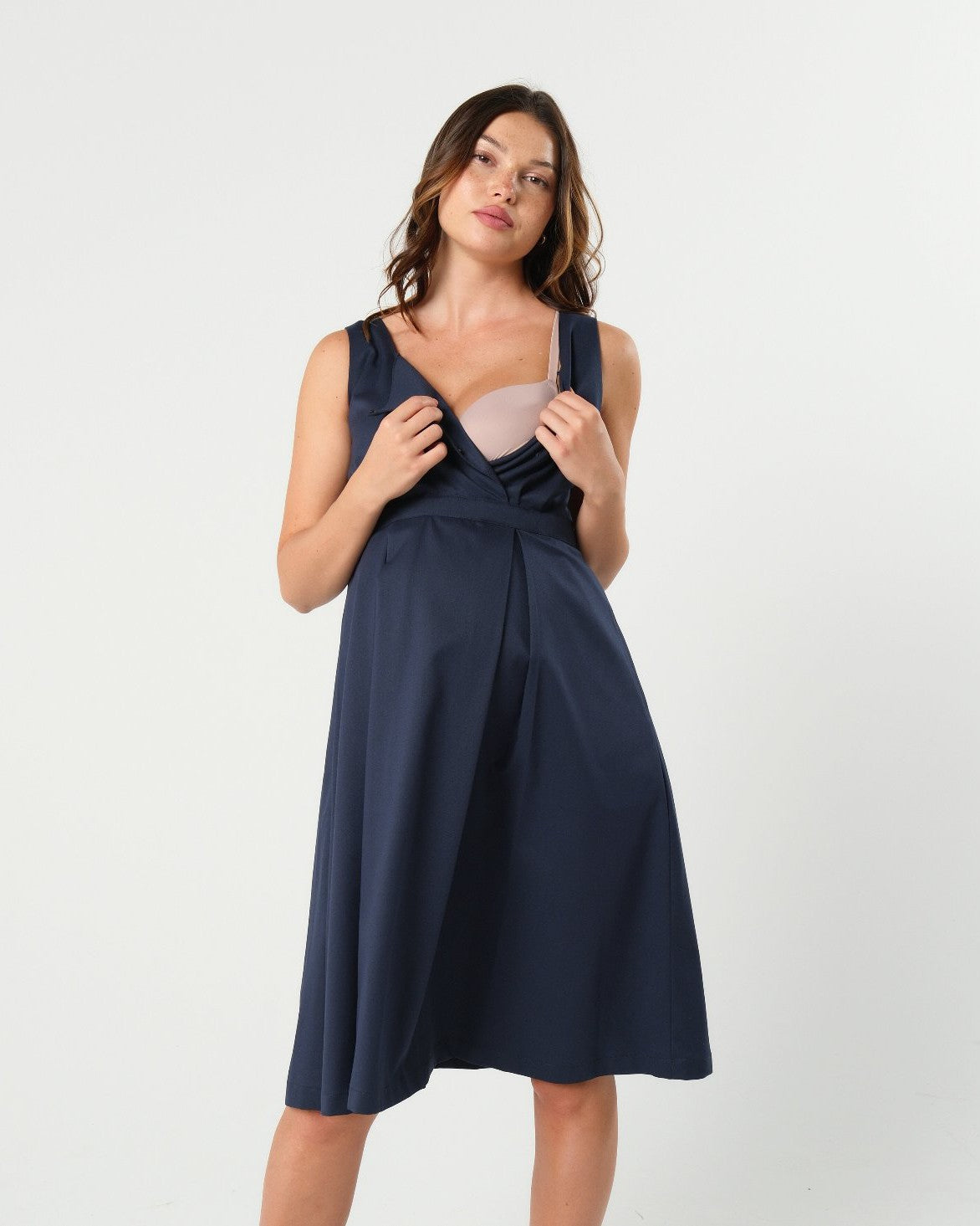 Luxury blue sleeveless maternity dress, from MARION's collection of elevated maternity and nursing dresses. Sustainable, available in standard and petite maternity sizes. Features designer breastfeeding access. Perfect maternity wedding guest dress, baby shower dress, or maternity tea party dress.