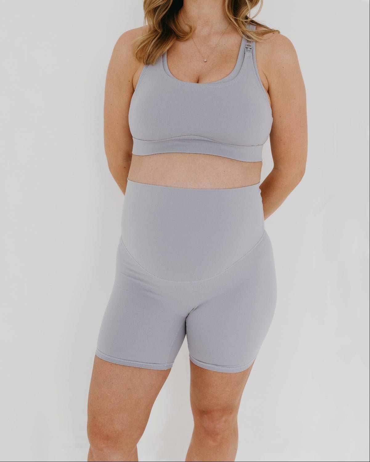 Light Gray AXK Maternity high-impact, racerback pregnancy and nursing sports bra. Part of AXK&#39;s collection of premium maternity athletic and activewear and designer loungewear collections. 
