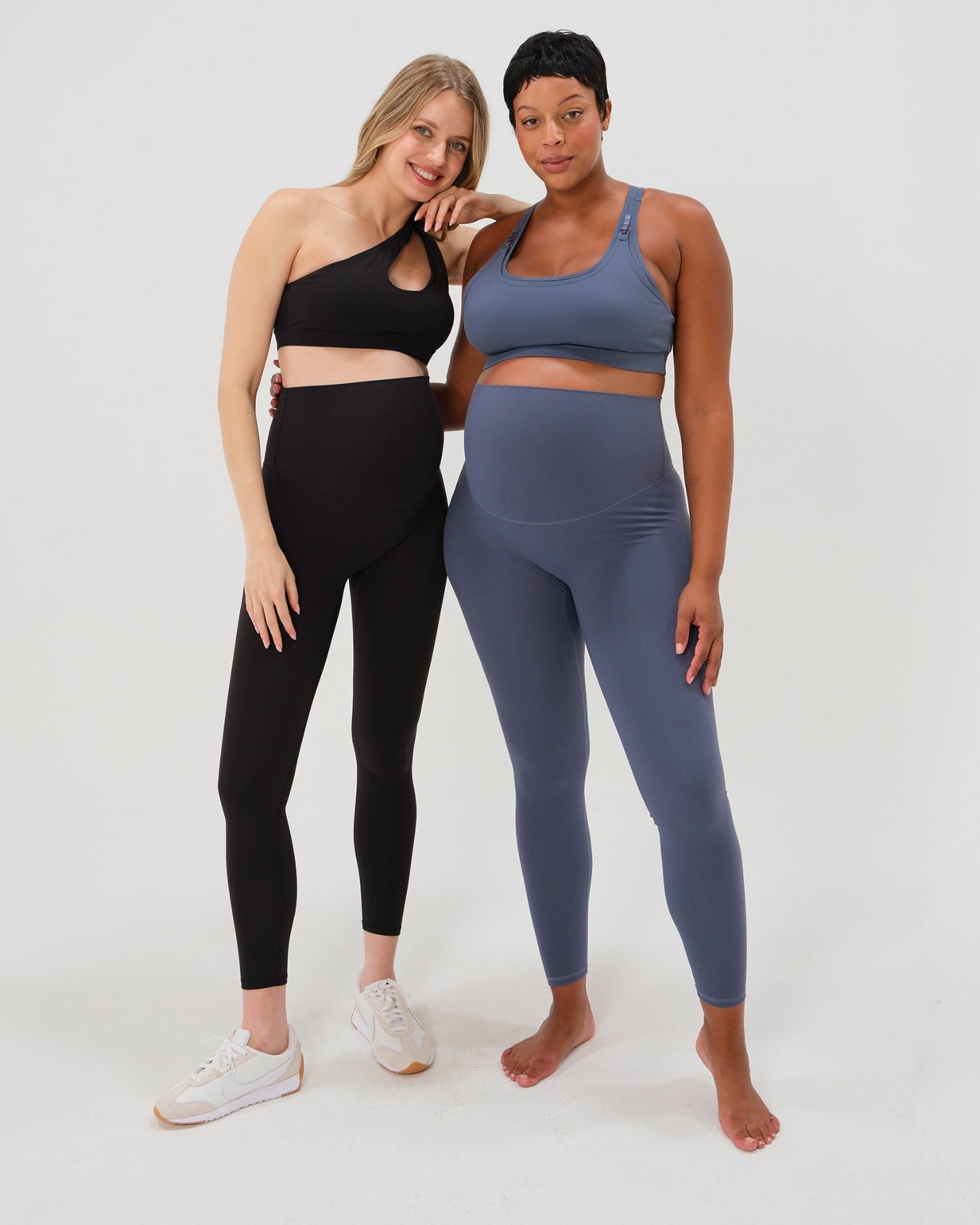 Pregnant models wearing premium AXK maternity leggings with a supportive high waist, bum flattering back v seam, seamless front design, and butter soft stretch fabric. Best selling with glowing 5-star reviews, these leggings are perfect for running, pregnancy yoga, walking, biking, or loungewear. High quality 2026 maternity athletic and activewear in regular and plus sizes. Petite and tall friendly. 