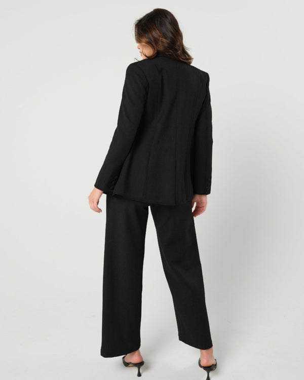 Black maternity blazer suit jacket in luxury Italian stretch suiting fabric. Empire waist separates for your best pregnancy, breastfeeding, and postpartum fit. Petite and regular sizes. 38% sustainable recycled fibers. Also sold by Nordstrom, Bloomingdale's, and Macy's maternity. 