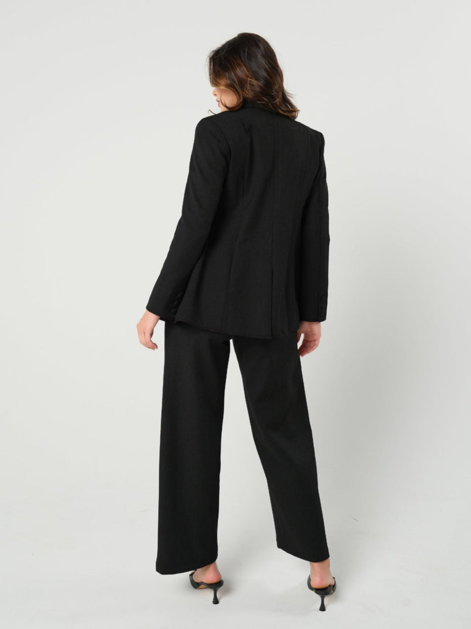 Black maternity blazer suit jacket in luxury Italian stretch suiting fabric. Empire waist separates for your best pregnancy, breastfeeding, and postpartum fit. Petite and regular sizes. 38% sustainable recycled fibers. Also sold by Nordstrom, Bloomingdale's, and Macy's maternity. 