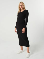 Black maternity sweater dress with discreet nursing access. Long knit maternity office wear dress is petite friendly and fits tall mamas like a midi dress. Perfect for baby shower, maternity guest, or business attire. MARION is luxury maternity fashion. 