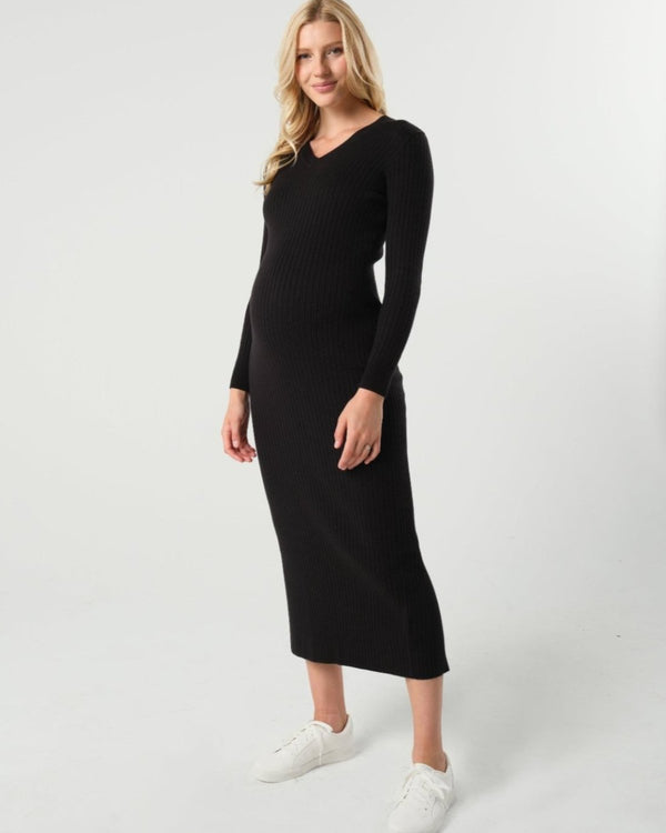 Black maternity sweater dress with discreet nursing access. Long knit maternity office wear dress is petite friendly and fits tall mamas like a midi dress. Perfect for baby shower, maternity guest, or business attire. MARION is luxury maternity fashion. 