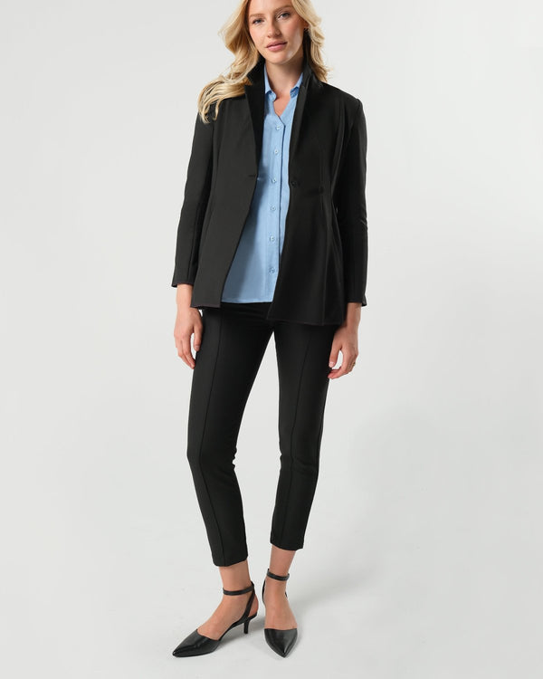 Black maternity work pants with stretch belly for bump comfort. Luxury maternity workwear trousers cut with stretch Italian suiting fabric. Featuring real pockets and slimming princess seams. Washable, sustainable, petite friendly business attire separates, perfect for pairing with a blazer as a pregnancy pantsuit. Courtroom friendly clothes for pregnant lawyers. 