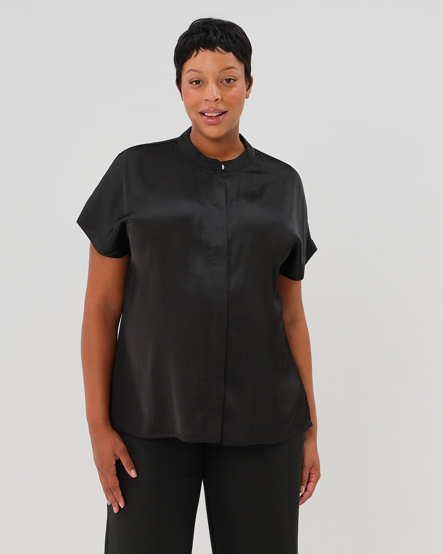 Premium black maternity and nursing satin shell top. Best pregnancy business shirt for work and the courtroom with exceptional reviews.  High quality breastfeeding workwear shirt by MARION, core season 2026.