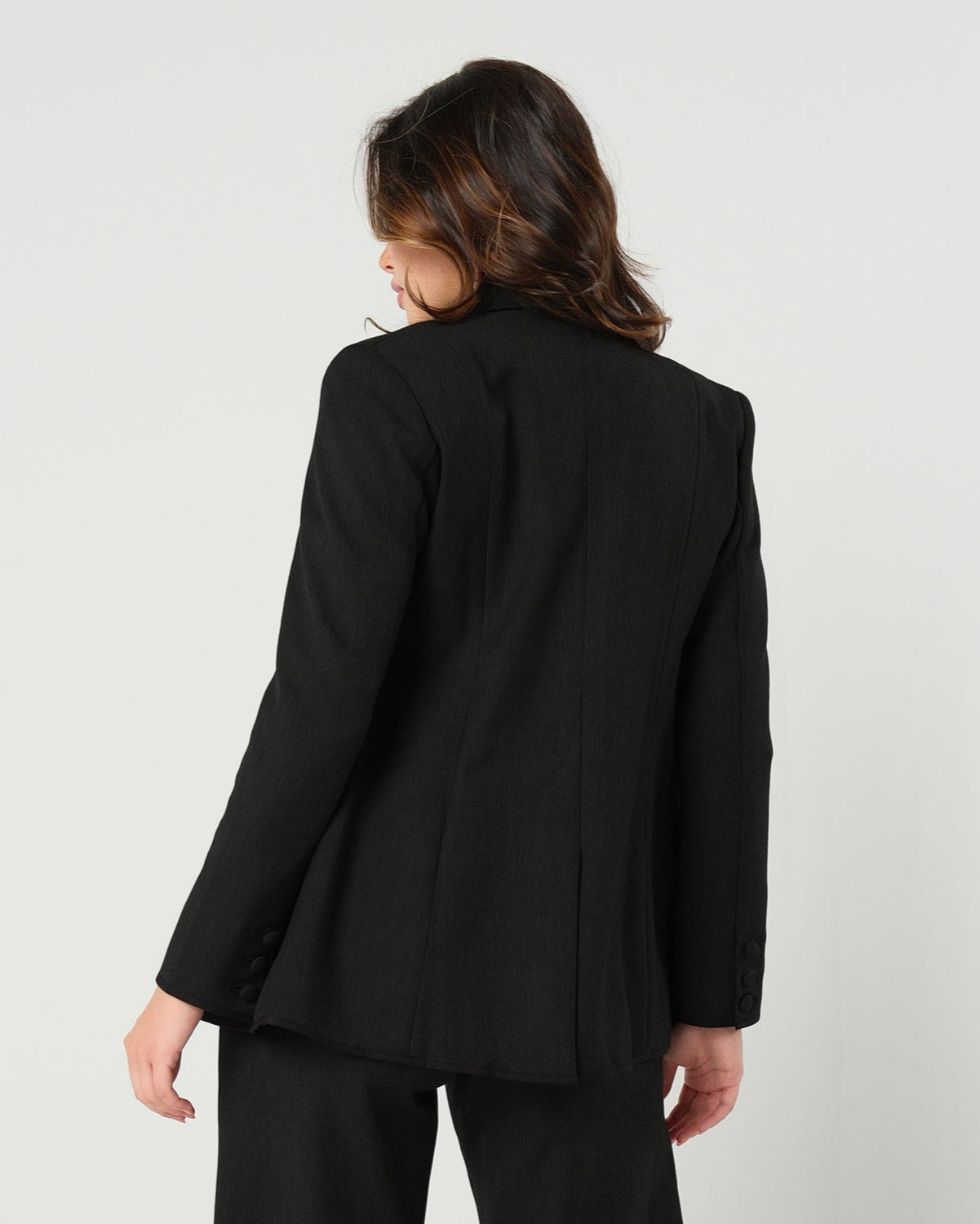 Black maternity blazer suit jacket in luxury Italian stretch suiting fabric. Empire waist suit separates for your best pregnancy, breastfeeding, and postpartum fit. Petite and regular sizes. 38% sustainable recycled fibers. Also sold by Nordstrom, Bloomingdale's, and Macy's maternity. 