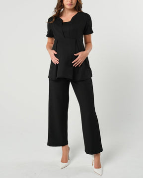 Black maternity wide leg dress pants for work with over belly band. Sustainable pregnancy business trousers cut with luxury Italian suiting fabric. Perfect maternity bottom separates for maternity pant suit.