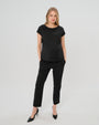 Black maternity dress pants, under belly style, cut in all-season wool blend with hidden flexible waist adjustment, deep pockets, and stylish straight leg. Maternity trousers cropped for tall mamas and full length for petite pregnant women. Postpartum friendly women's wear for business, wedding guest, dinner, and occasion.