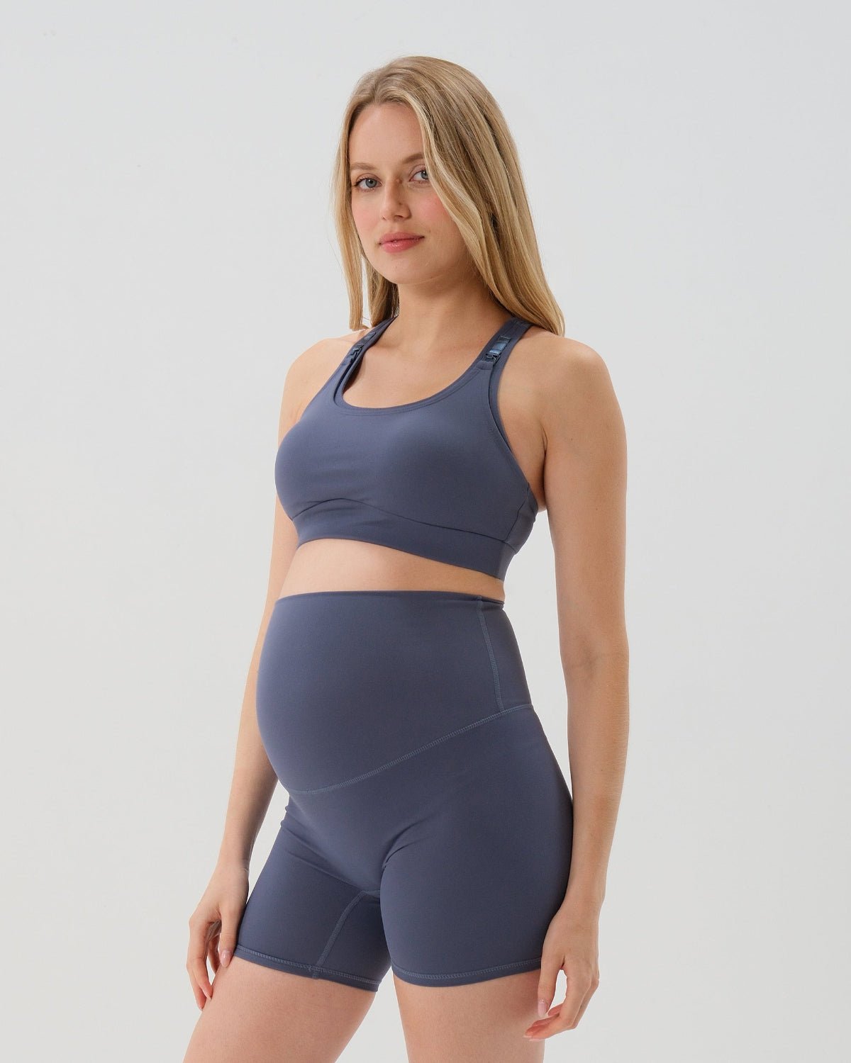 Blue AXK Maternity high-impact, racerback pregnancy and nursing sports bra. Part of AXK's collection of premium maternity athletic and activewear and designer loungewear collections. 