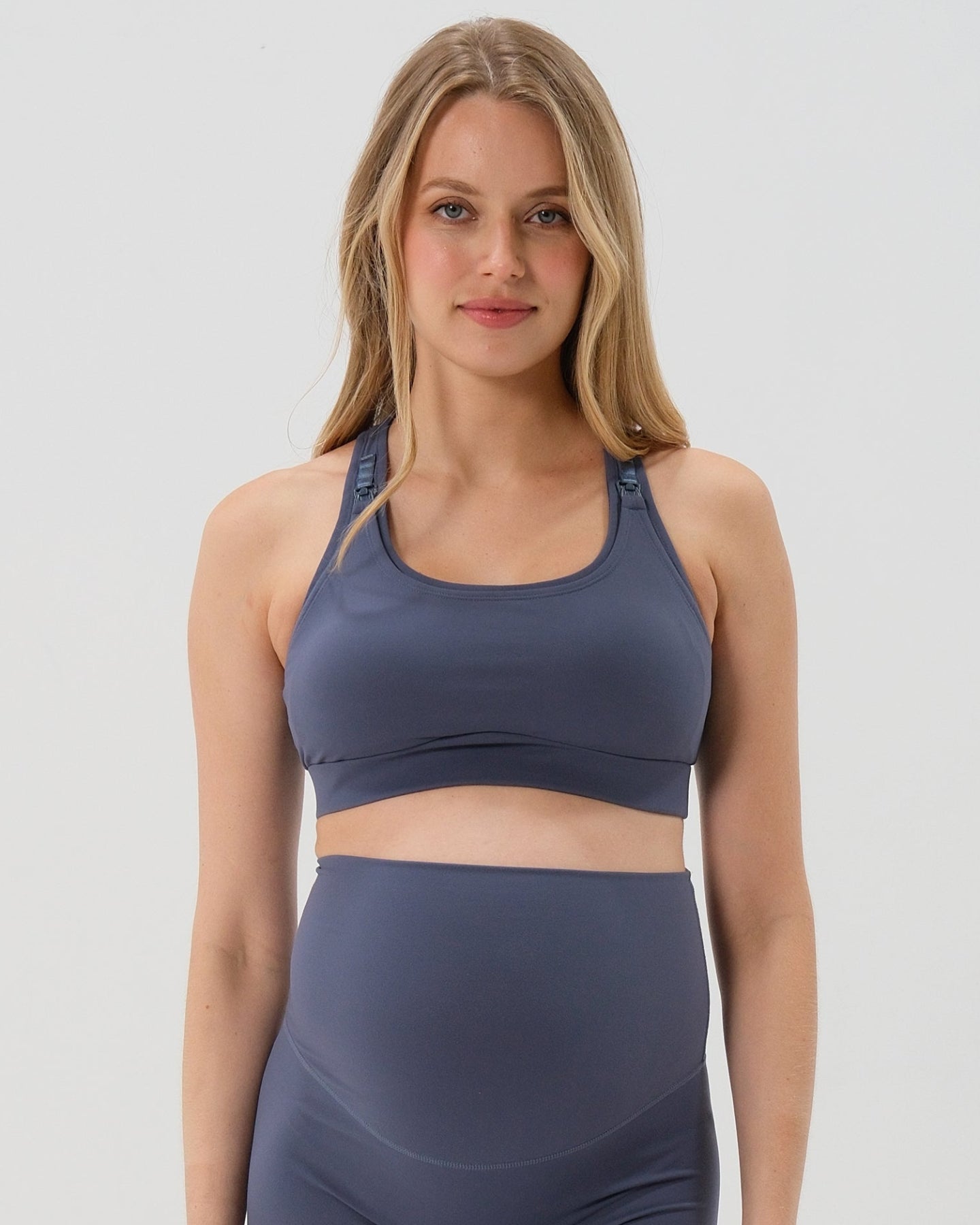 Blue AXK maternity high-impact, racerback pregnancy and nursing sports bra. Part of AXK's 2026 collection of premium maternity athletic and activewear and designer loungewear collections. Our reviews say it all - AXK's bras are the best on the market. 