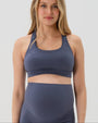 Blue AXK Maternity high-impact, racerback pregnancy and nursing sports bra. Part of AXK's collection of premium maternity athletic and activewear and designer loungewear collections. 