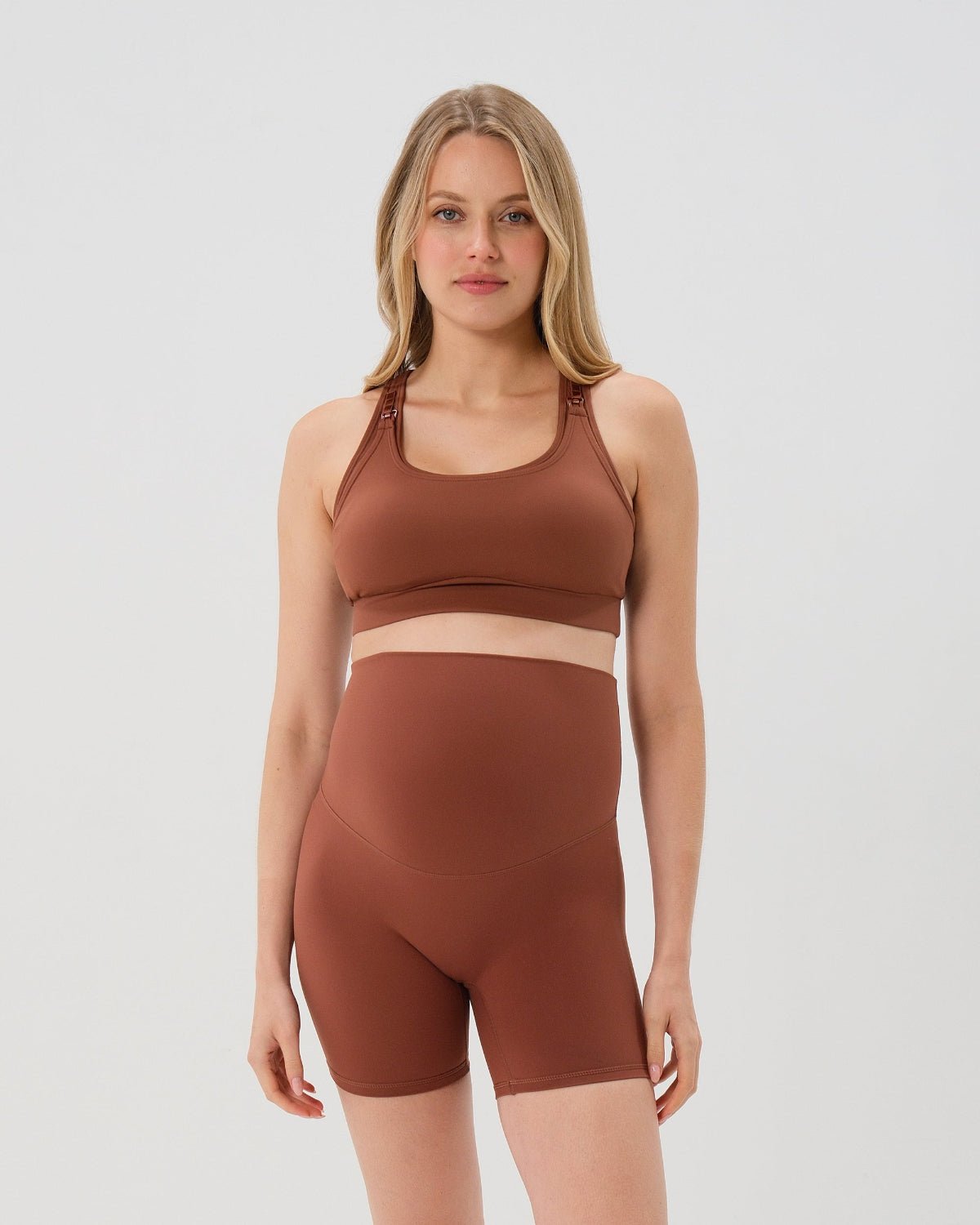 Brown AXK Maternity high-impact, racerback pregnancy and nursing sports bra. Part of AXK's collection of premium maternity athletic and activewear and designer loungewear collections. 