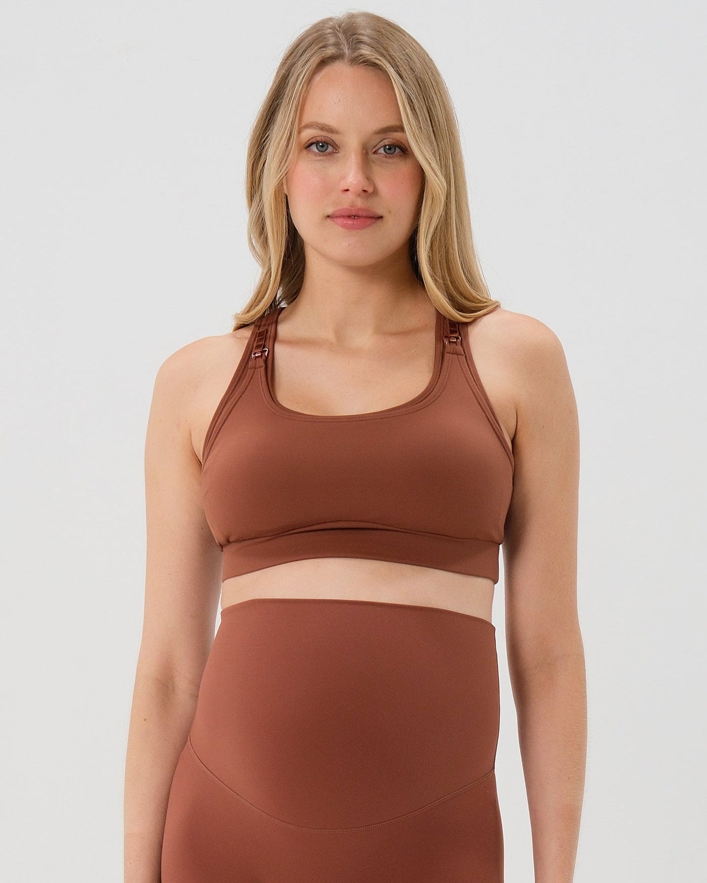 Brown AXK maternity high-impact, racerback pregnancy and nursing sports bra. Part of AXK's 2026 collection of premium maternity athletic and activewear and designer loungewear collections. Our reviews say it all - AXK's bras are the best on the market. 