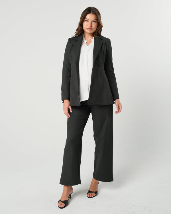 Charcoal gray maternity blazer suit jacket in luxury Italian stretch suiting fabric. Empire waist pant suit separates for your best pregnancy, breastfeeding, and postpartum fit. Petite and regular sizes. 38% sustainable recycled fibers. Also sold by Nordstrom, Bloomingdale's, and Macy's maternity. 