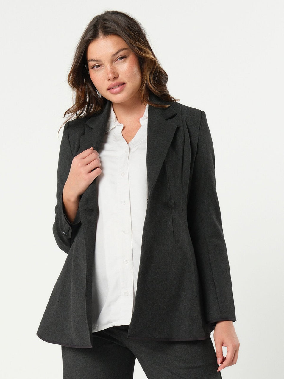 Charcoal gray maternity blazer suit jacket in luxury Italian stretch suiting fabric. Empire waist pant suit separates for your best pregnancy, breastfeeding, and postpartum fit. Petite and regular sizes. 38% sustainable recycled fibers. Also sold by Nordstrom, Bloomingdale's, and Macy's maternity. 