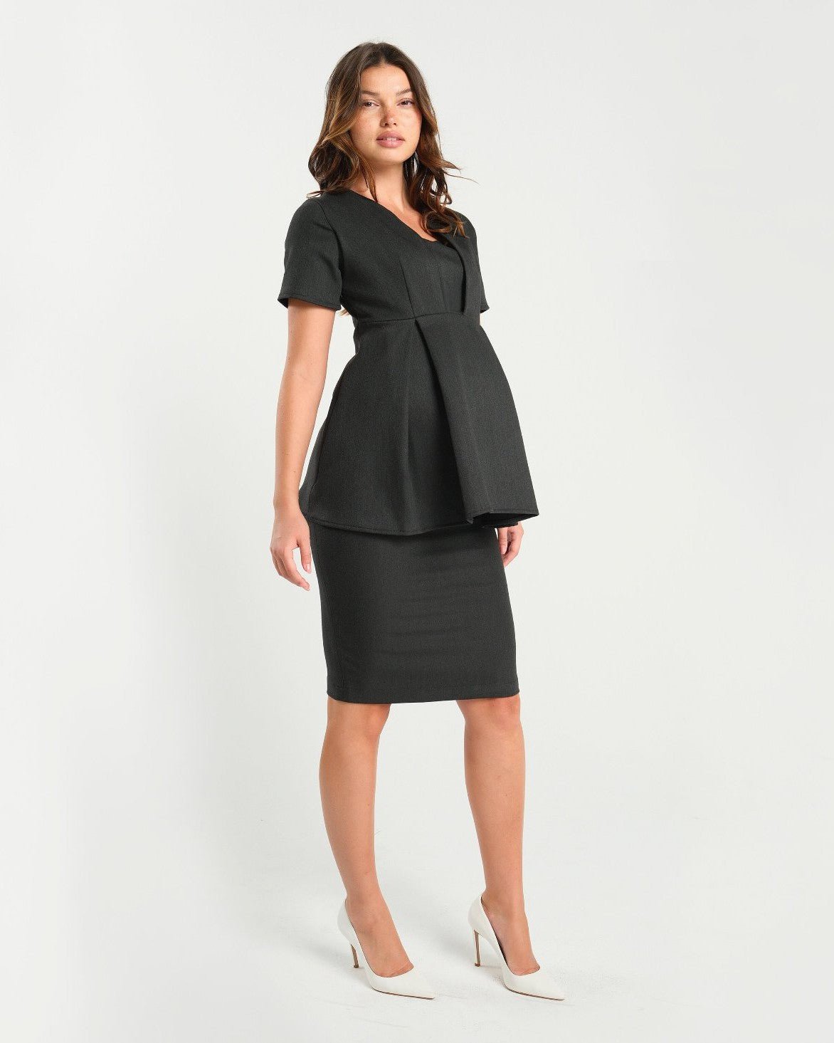 Premium quality charcoal gray maternity pencil skirt by MARION. Best luxury corporate maternity business clothes for pregnant lawyers and executives. Best sustainable, washable, travel friendly workwear for 2026.