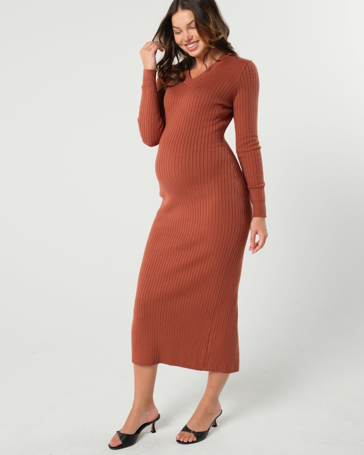 Our premium quality copper orange maternity sweater dress offers discreet nursing access. This long sleeve knit maternity dress has 100% 5-star reviews and is washable, petite friendly, and fits tall women beautifully as a midi dress. Perfect for baby shower, wedding guest, or business attire. 

MARION offers the best elevated, flattering maternity dresses of 2026 for work, your baby shower, wedding guest outfits, party and occasion wear, church, and more. 