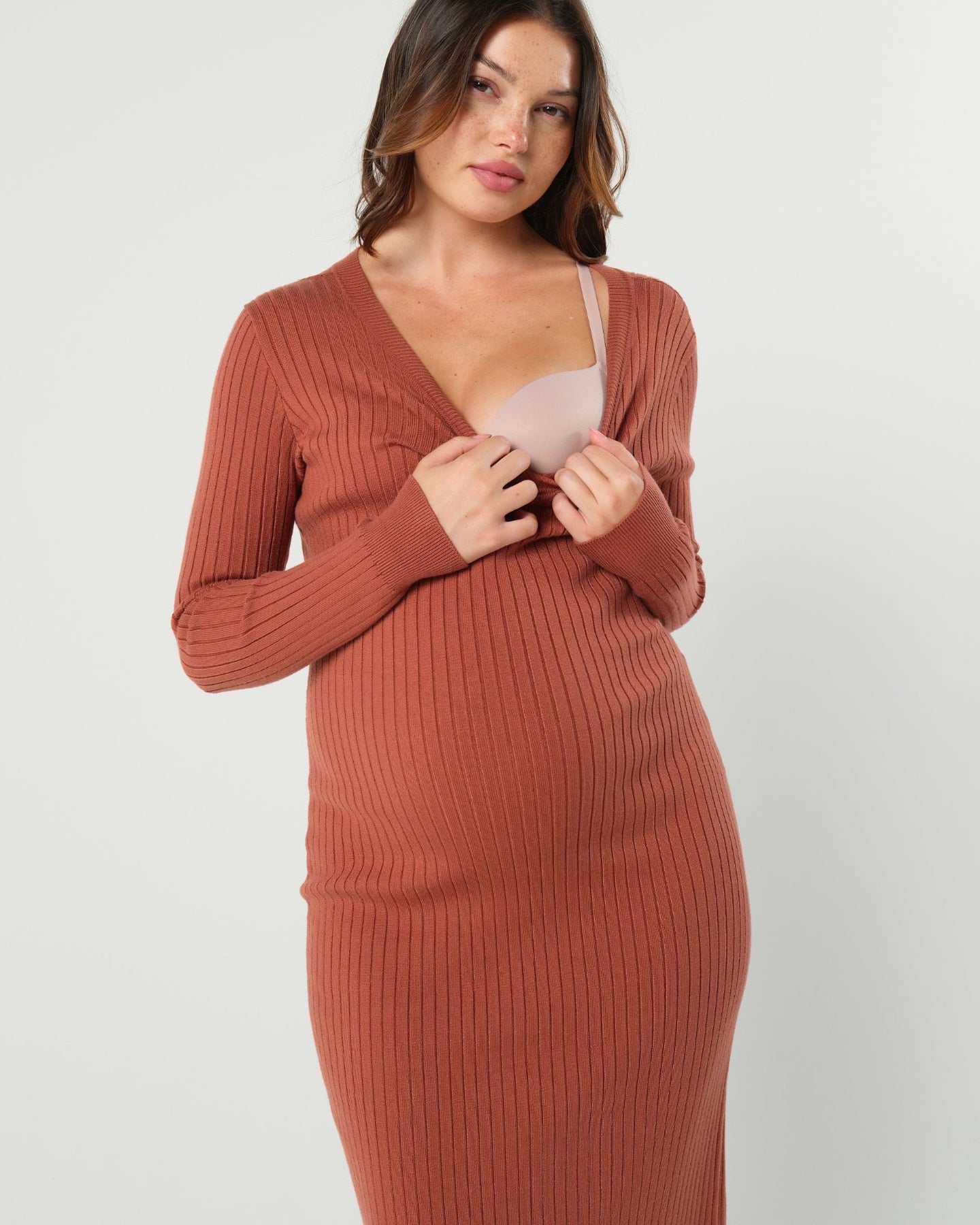 Our premium quality copper orange maternity sweater dress offers discreet nursing access. This long sleeve knit dress has 100% 5-star reviews and is washable, petite friendly, and fits tall women beautifully as a midi dress. Perfect for baby shower, wedding guest, or business attire. 

MARION offers the best elevated, flattering maternity dresses of 2026 for work, your baby shower, wedding guest outfits, party and occasion wear, church, and more. 