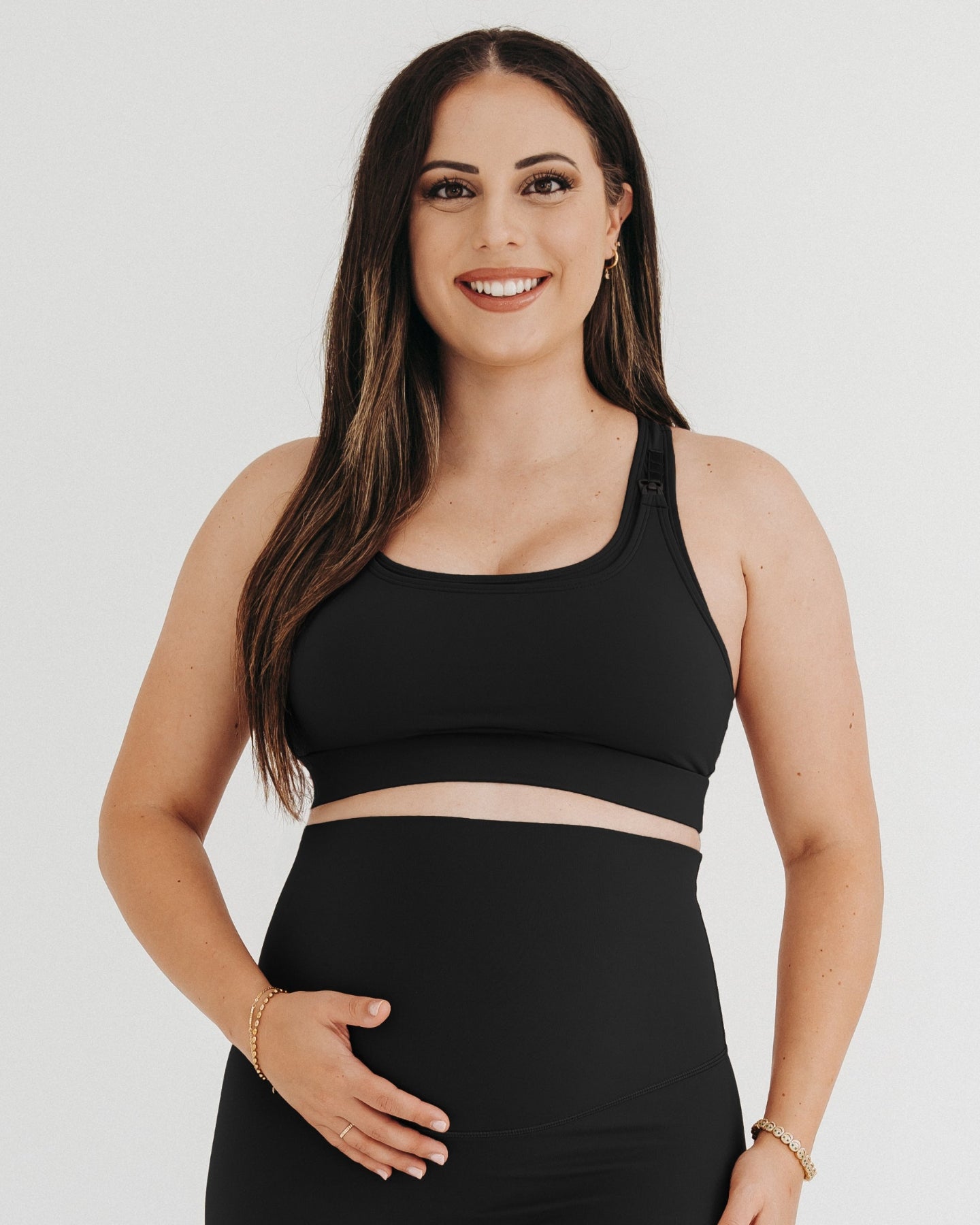 Black AXK maternity high-impact, racerback pregnancy and nursing sports bra. Part of AXK's 2026 collection of premium maternity athletic and activewear and designer loungewear collections. Our reviews say it all - AXK's bras are the best on the market. Petite and tall friendly and available in regular and plus size options. 