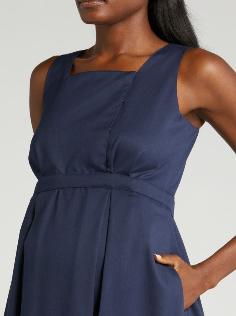 Luxury blue maternity dress, from MARION's collection of luxe maternity and nursing dresses. Sustainable, available in standard and petite maternity sizes. Features designer breastfeeding access. Perfect maternity wedding guest dress, baby shower dress, or maternity tea party dress.