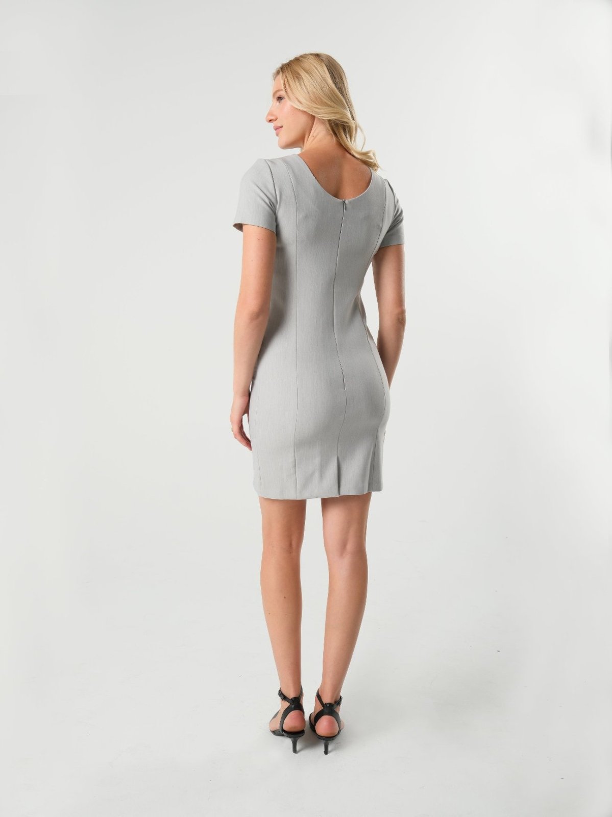 Light gray maternity and nursing dress for work. Maternity business apparel by MARION. Nursing dress for office with hidden breastfeeding zipper. Luxury, sustainable Italian suiting fabric, short sleeves, round neckline. Petite friendly, best maternity workwear.