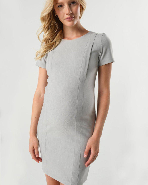 Light gray maternity and nursing dress for work. Maternity business apparel by MARION. Nursing dress for office with hidden breastfeeding zipper. Luxury, sustainable Italian suiting fabric, short sleeves, round neckline. Petite friendly, best maternity workwear.