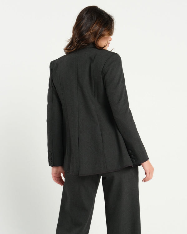 Charcoal gray maternity blazer suit jacket in luxury Italian stretch suiting fabric. Empire waist pant suit separates for your best pregnancy, breastfeeding, and postpartum fit. Petite and regular sizes. 38% sustainable recycled fibers. Also sold by Nordstrom, Bloomingdale's, and Macy's maternity. 