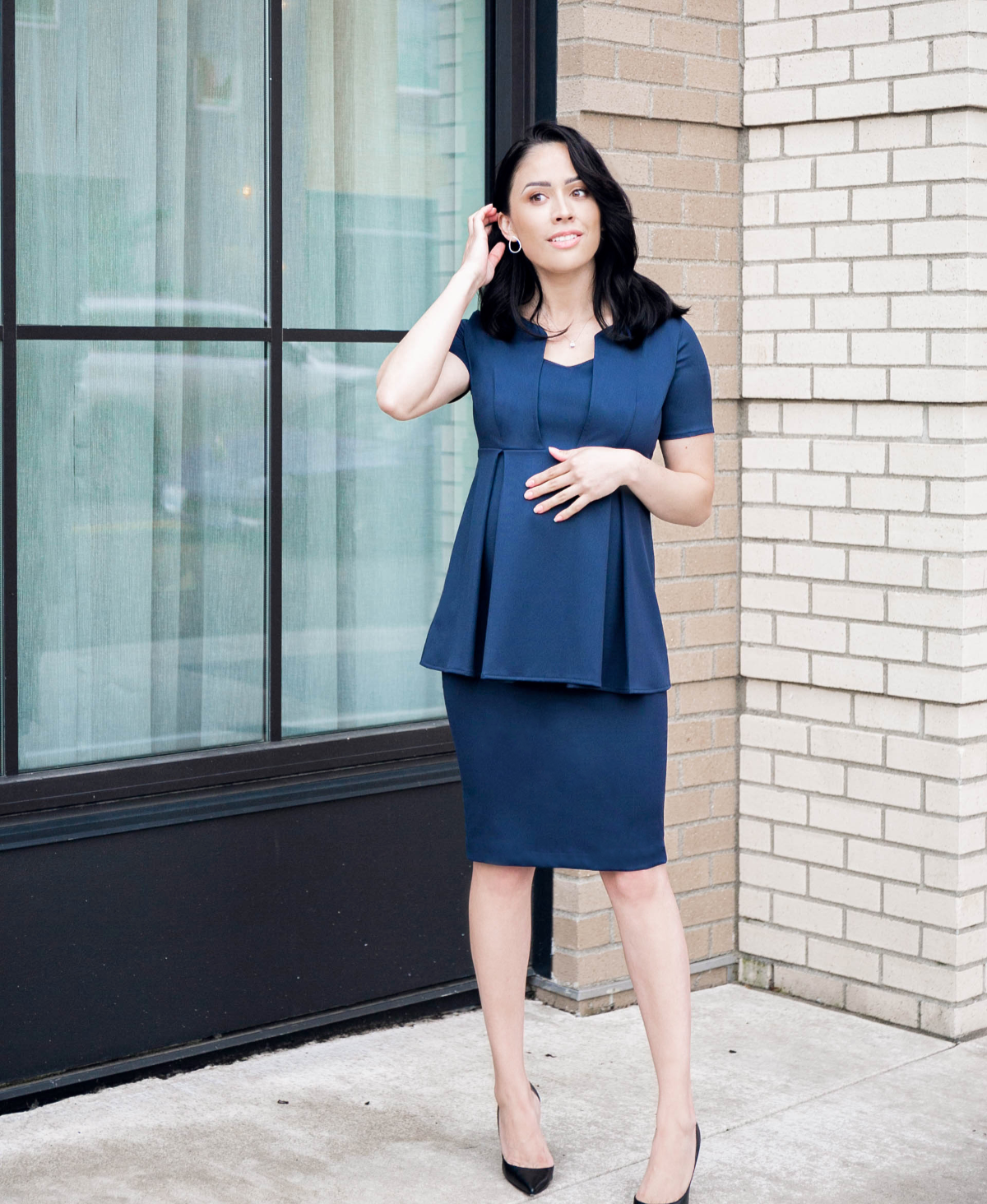 Navy blue maternity pencil skirt separates. Luxury corporate maternity business clothes for pregnant lawyers, executives, and boss ladies. Sustainable, washable, travel friendly workwear.