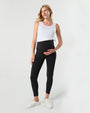 Black MARION maternity leggings with cell phone pocket, made of soft, luxury recycled nylon for pregnancy comfort. Petite friendly maternity pants.