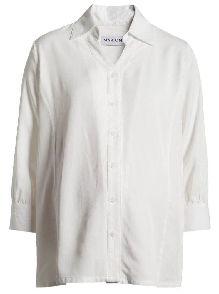 White maternity button down shirt for pregnancy and nursing. Maternity workwear top with no gap technology. Cut with luxury sustainable TENCEL for the office, the courtroom, or Saturday errands.