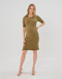 Olive green maternity sweater dress with 3/4 sleeves, feminine ruffle hem detail, and luxurious cotton stretch knit. Perfect for work outfits, wedding guest, holiday parties, baby showers, and street style. Postpartum friendly. 