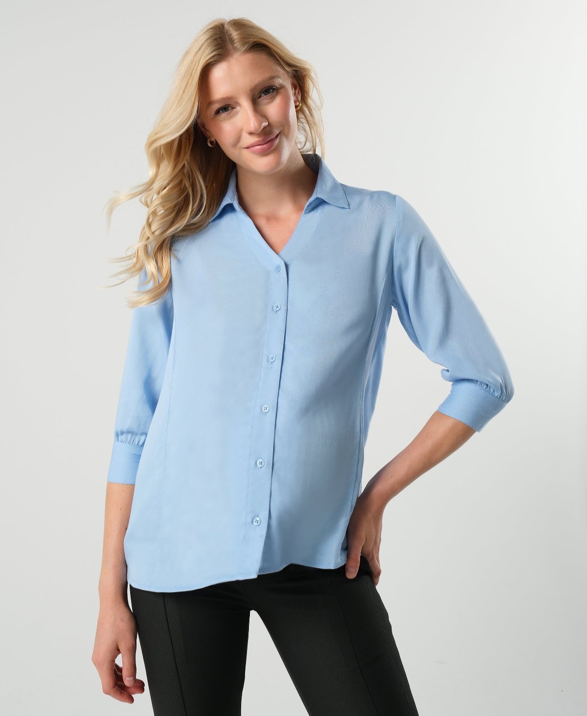 Pale blue maternity and nursing button down shirt by MARION. Sustainable TENCEL maternity business top in regular and petite sizing. Luxury pregnancy workwear. 