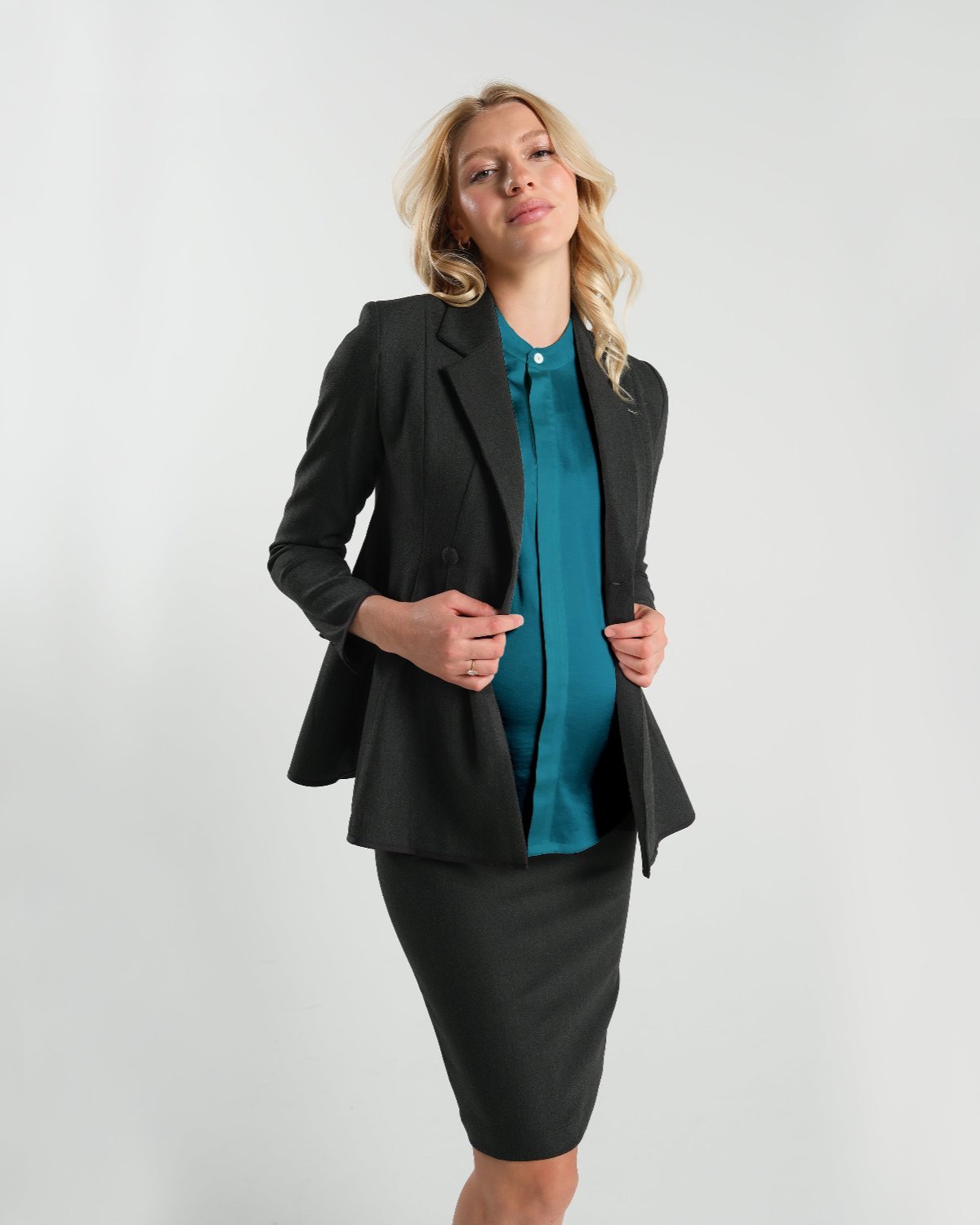 Luxury turquoise green blue maternity and nursing shell top, worn with maternity suit blazer and pencil skirt. Pregnancy business attire for work and the courtroom. Pregnant lawyer and petite friendly. High quality jewel teal breastfeeding workwear shirt by MARION. 