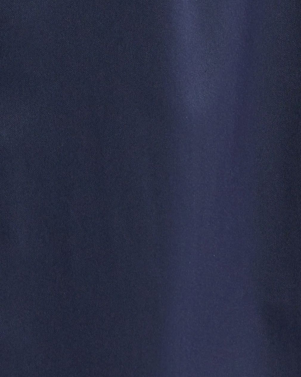 Fabric detail from MARION&#39;s luxury blue maternity dress, from MARION&#39;s collection of elevated maternity and nursing dresses. Sustainable, available in standard and petite maternity sizes. Features designer breastfeeding access. Perfect maternity wedding guest dress, baby shower dress, or maternity tea party dress.