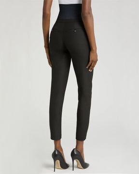 Black maternity work pants with stretch belly for bump comfort. Luxury maternity workwear trousers cut with stretch Italian suiting fabric. Featuring real pockets and slimming princess seams. Washable, sustainable, petite friendly business attire separates, perfect for pairing with a blazer as a pregnancy pantsuit. Courtroom friendly clothes for pregnant lawyers. 