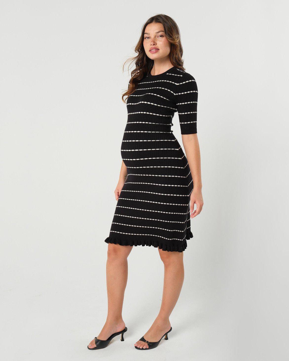 Best selling knit maternity and nursing sweater dress in black and white stripes. This knee length dress features three-quarter sleeves with a feminine hem detail and a back zip for discreet breastfeeding access. Boasting countless 5-star reviews, this dress is ideal for maternity business workwear, date night, church, a wedding guest outfit, brunch, and occasion. For 2026, this style is petite and tall friendly, and offered in regular and plus size. Also available at Nordstrom, Bloomingdale's, and Macy's. 