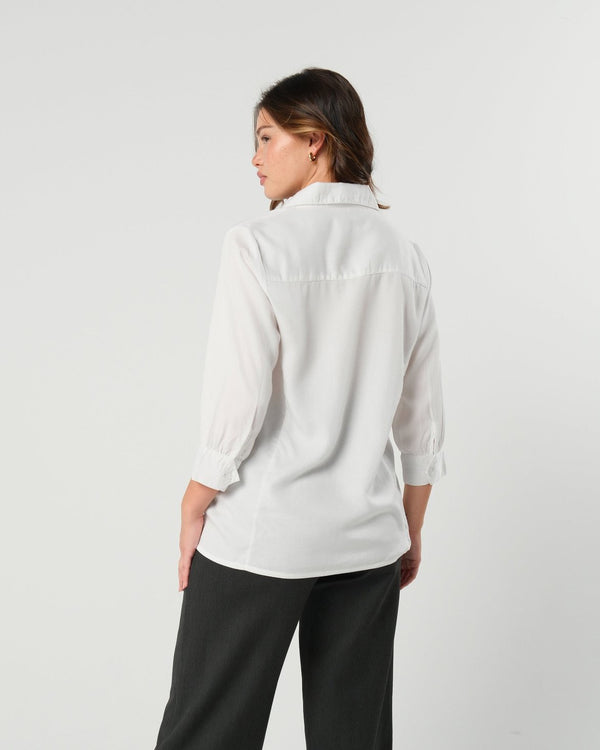 White maternity button down shirt for pregnancy and nursing. Maternity workwear top with no gap technology. Cut with luxury sustainable TENCEL for the office, the courtroom, or Saturday errands.