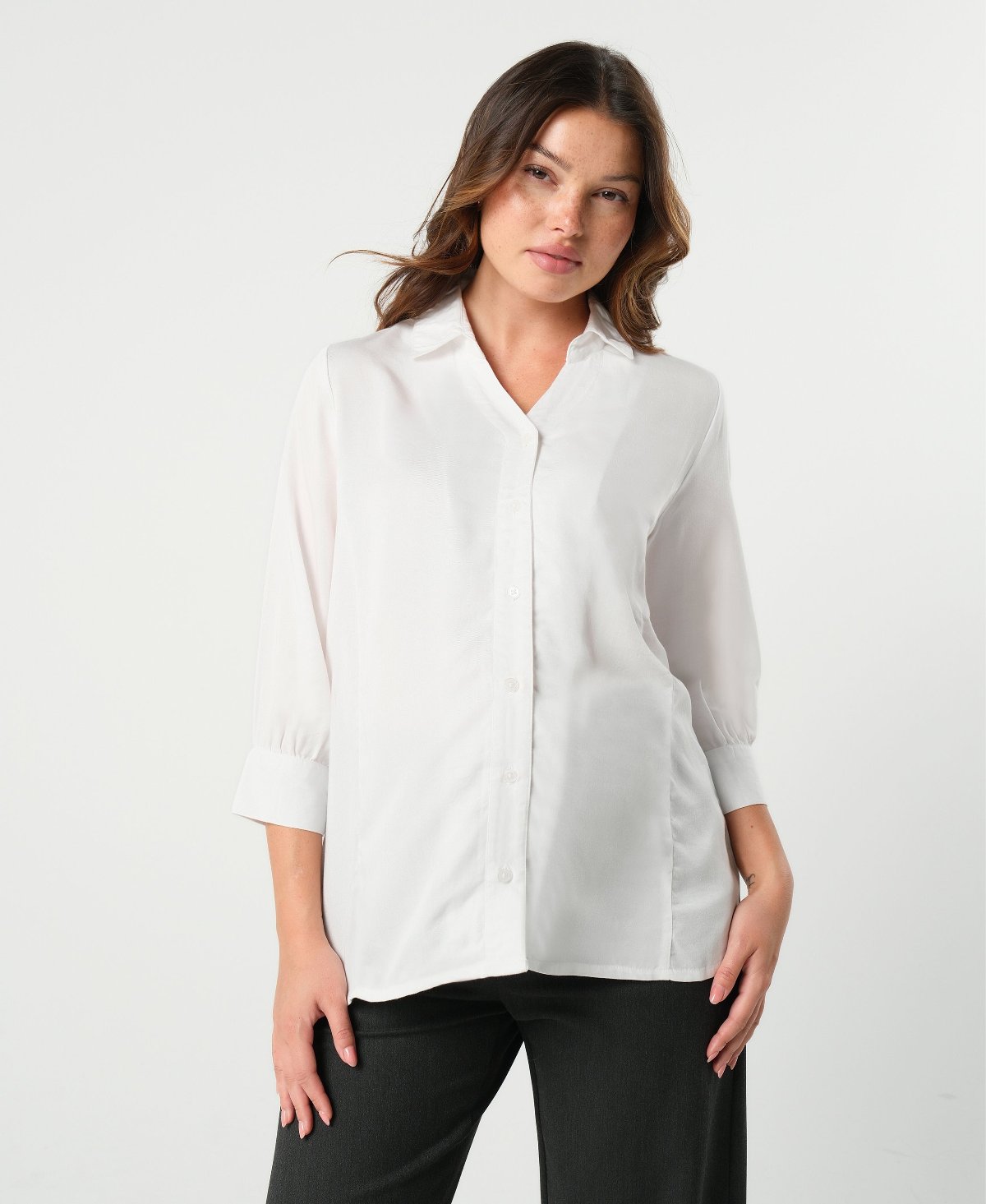 White maternity button down shirt for pregnancy and nursing. Maternity workwear top with no gap technology. Cut with luxury sustainable TENCEL for the office, the courtroom, or Saturday errands.