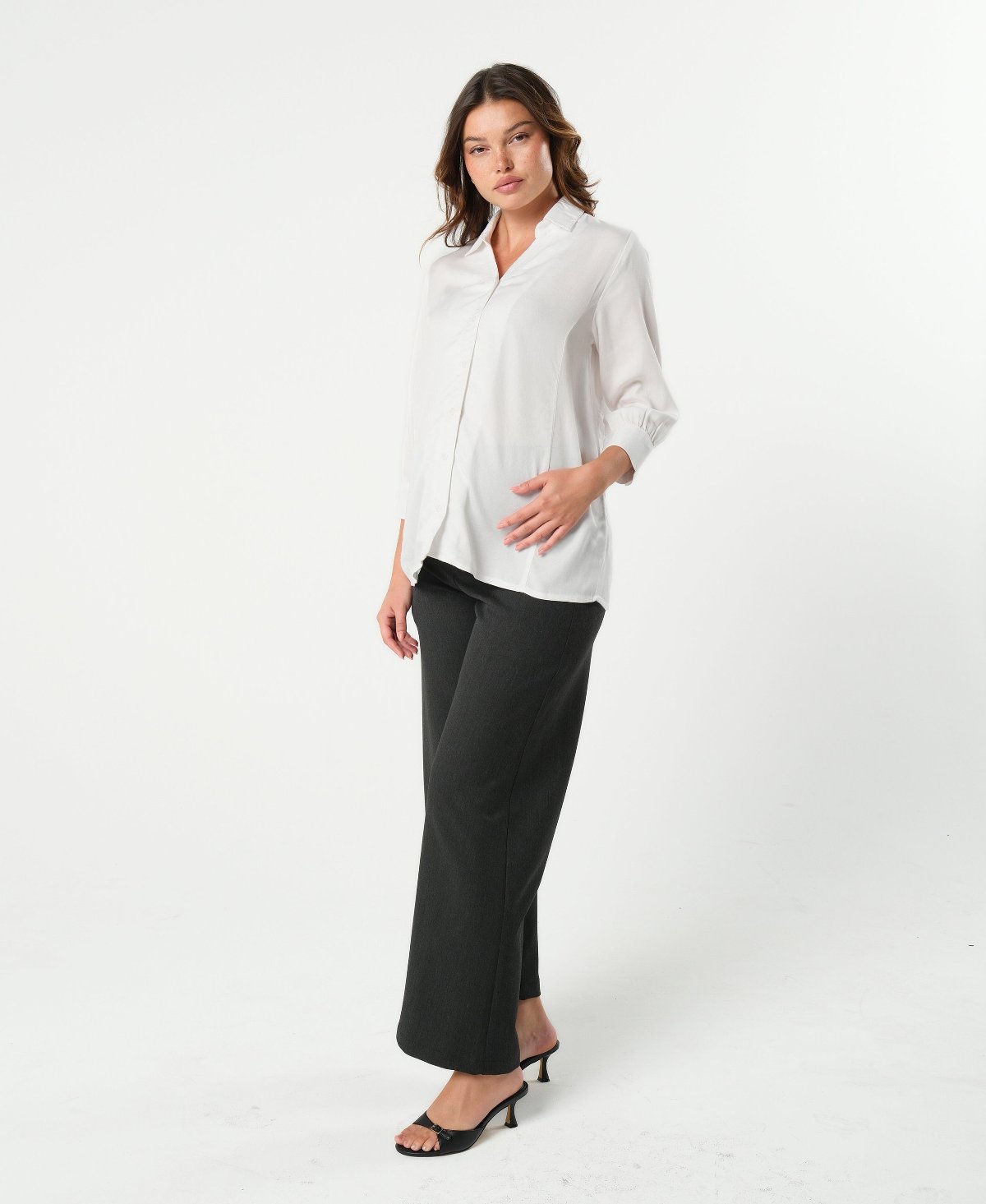 White maternity button down shirt for pregnancy and nursing. Maternity workwear top with no gap technology. Cut with luxury sustainable TENCEL for the office, the courtroom, or Saturday errands.