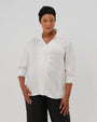 Plus size woman in maternity button down shirt for pregnancy and nursing by MARION with dozens of 5-star reviews.